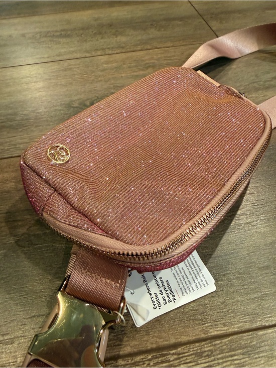 lululemon athletica Handbags - New with tags Lululemon Everywhere Belt Bag *Glitter in a pretty pink/rose gold